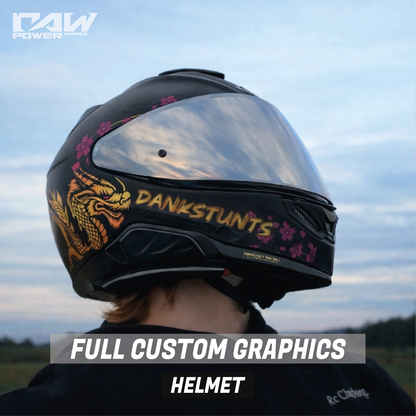 Helmet with custom graphics and 'Dankstunts' branding against a sky background
